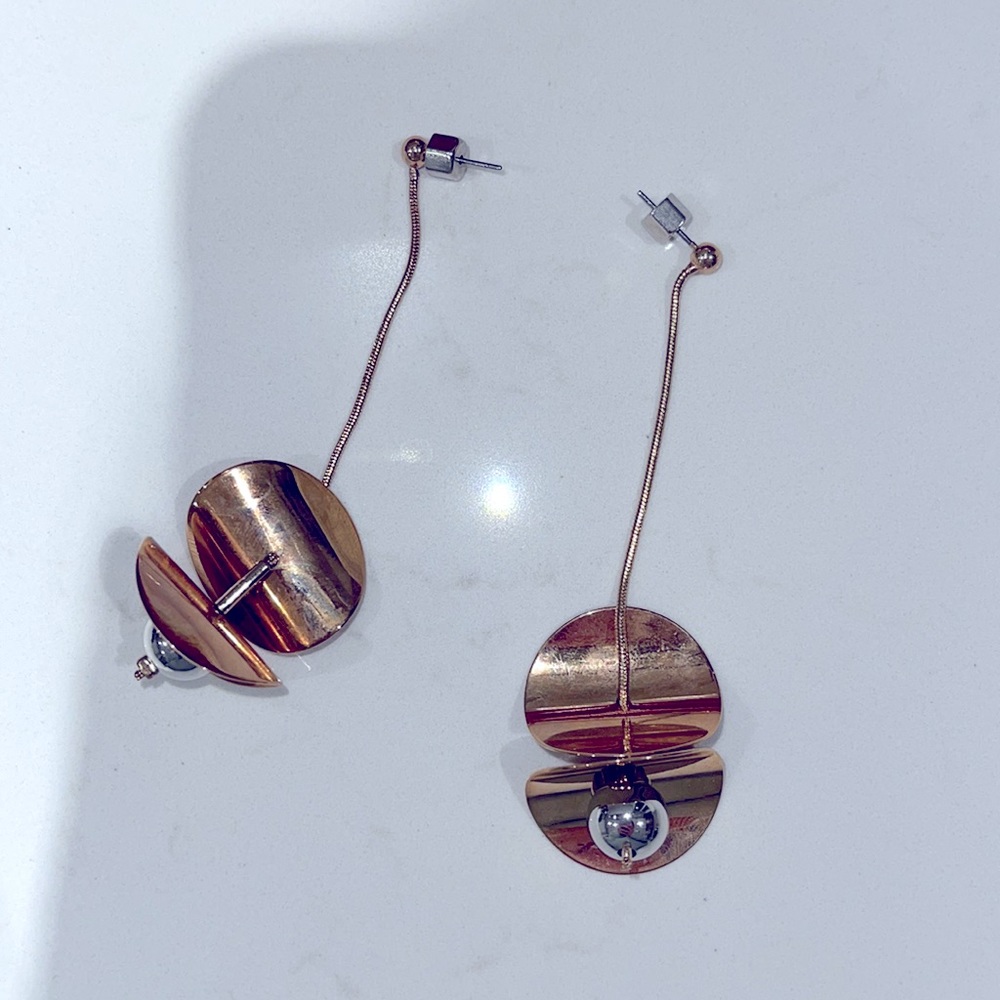 Shiny dangling earrings